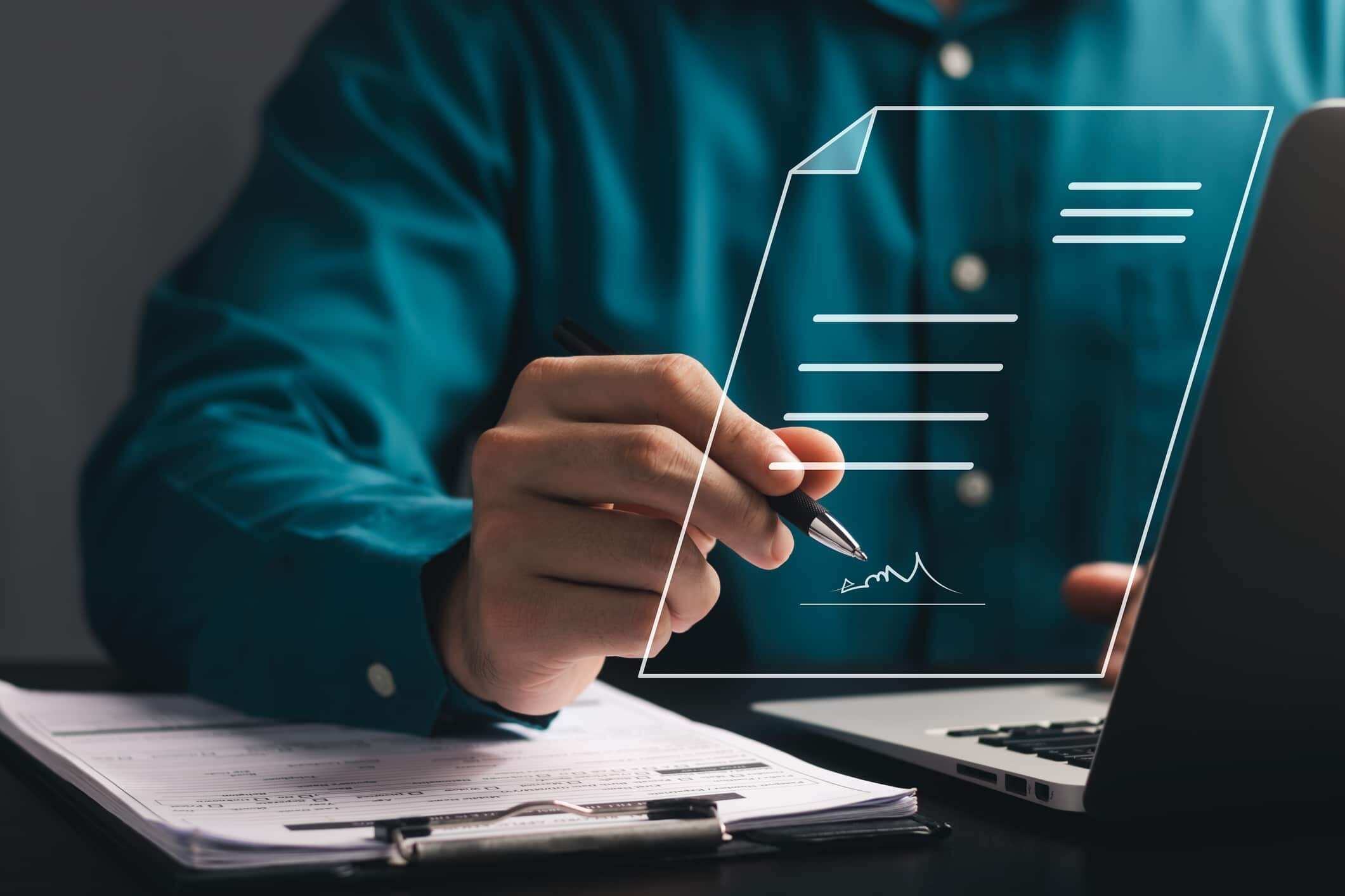 Person signs electronic documents on digital documents on virtual laptop screen