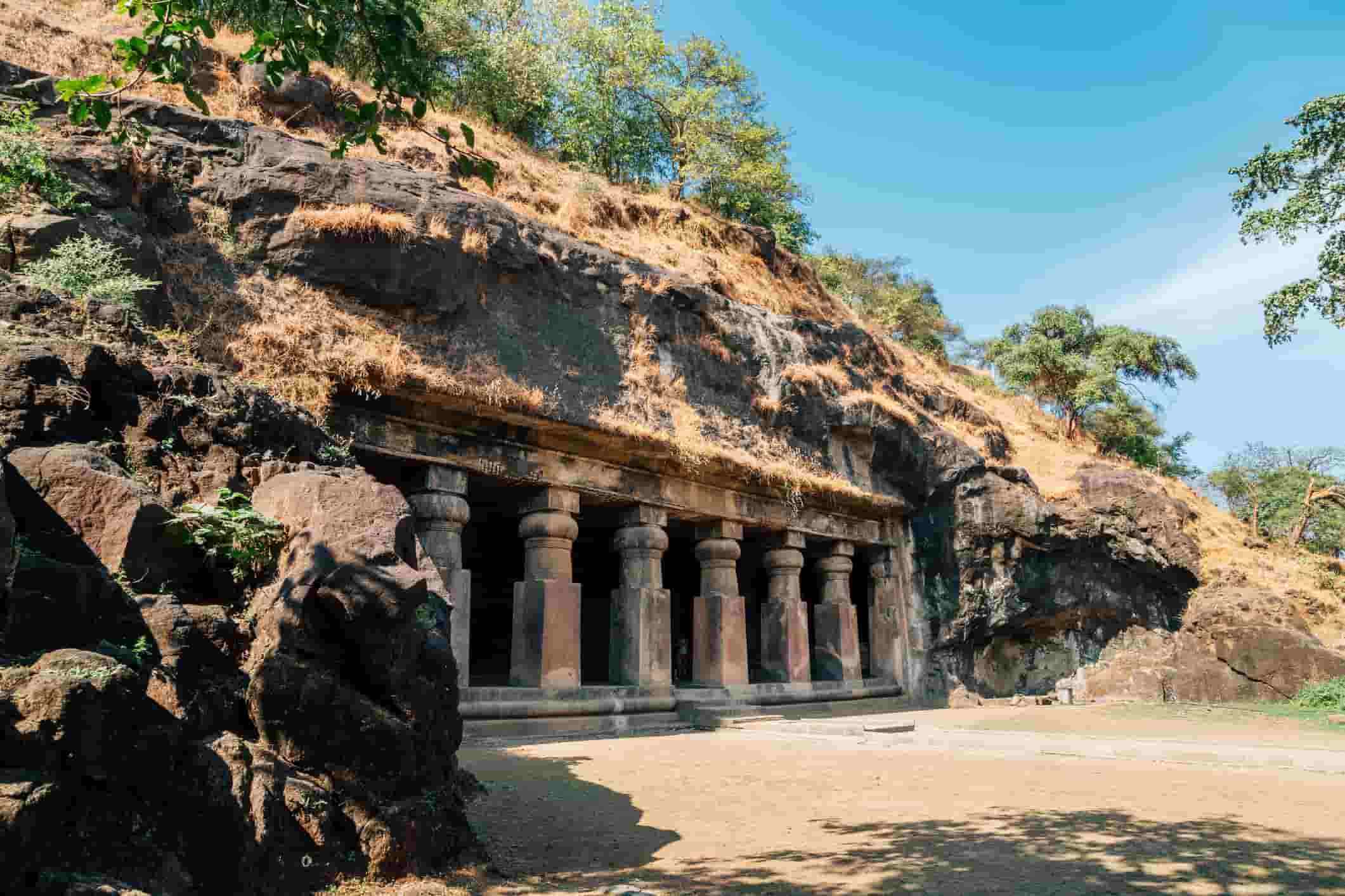 The Elephanta Caves in Mumbai, India, featuring a magnificent Hindu temple carved into the rock face.